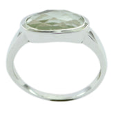 Rina light green solitaire ring with faceted oval gemstone set in silver band